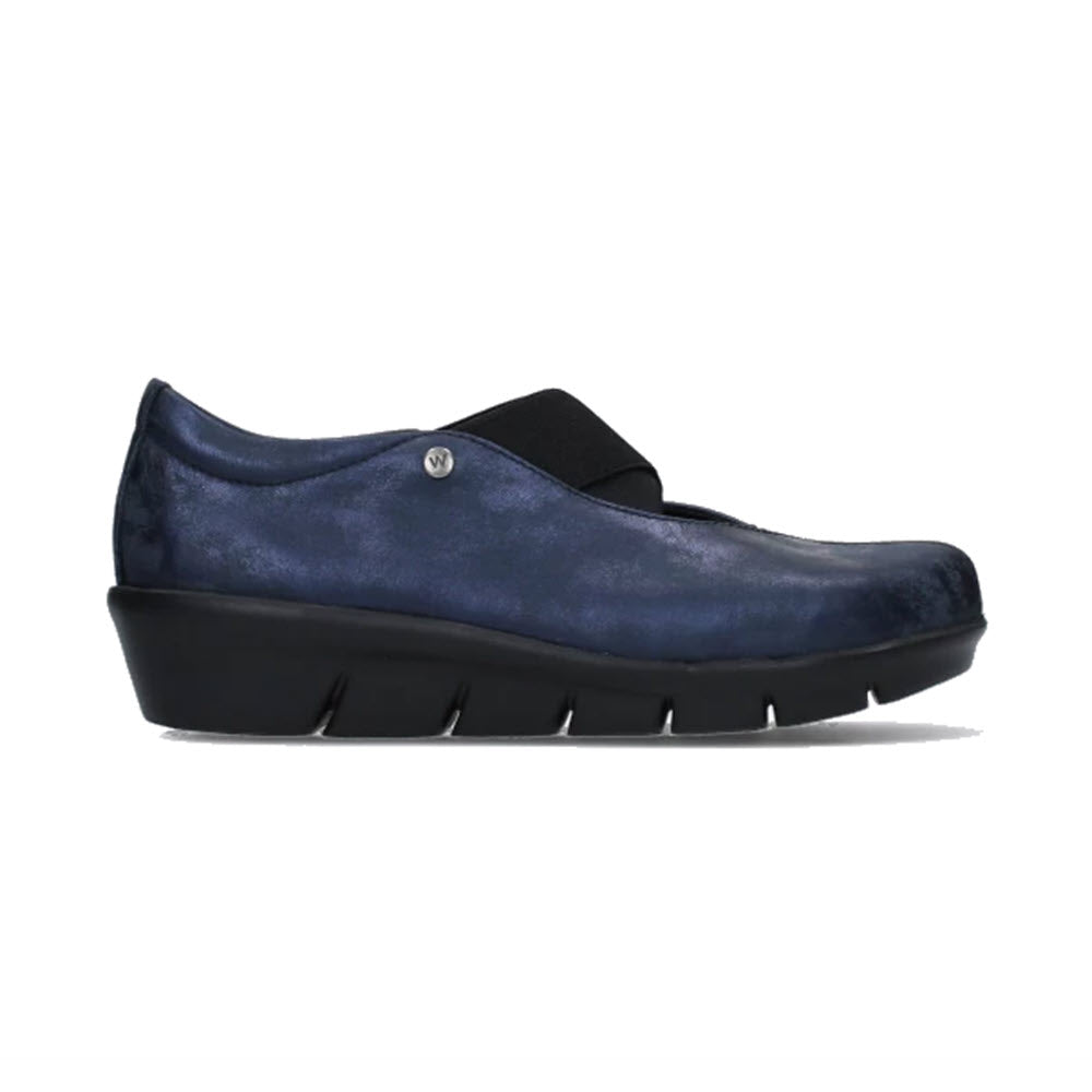 Side view of a women's dark blue, slip-on shoe with a black elastic strap and a black wedge heel featuring an ultra-light outsole. Product Name: WOLKY CURSA AMALIA NUBUCK NAVY - WOMENS Brand Name: Wolky