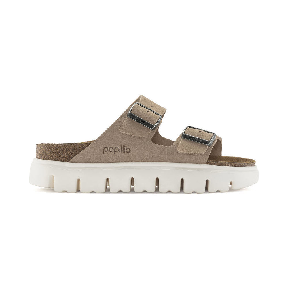 Side view of a BIRKENSTOCK ARIZONA CHUNKY WARM SAND - WOMENS with two adjustable straps and a white chunky platform sole.