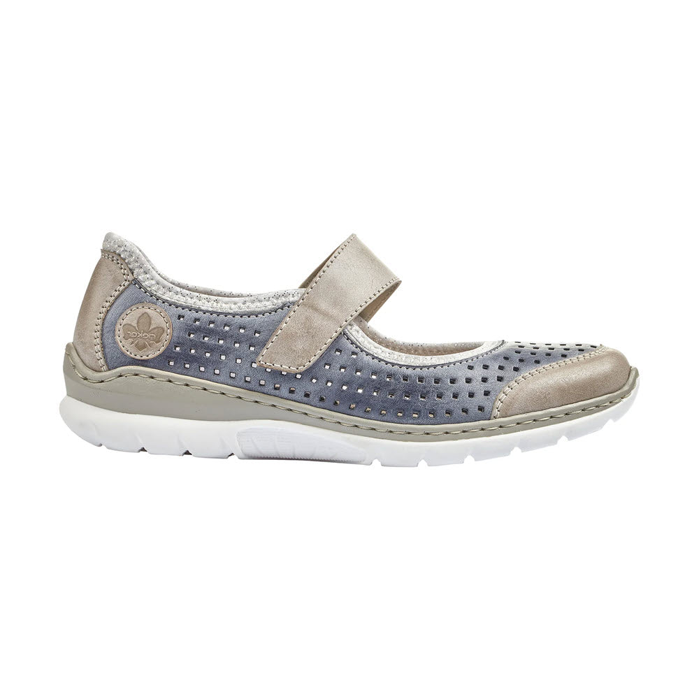 The Rieker Perfed Maryjane Ocean Women's sneaker, designed in shades of grey and beige, features a perforated design, an adjustable Velcro strap, and a cushioned white sole.