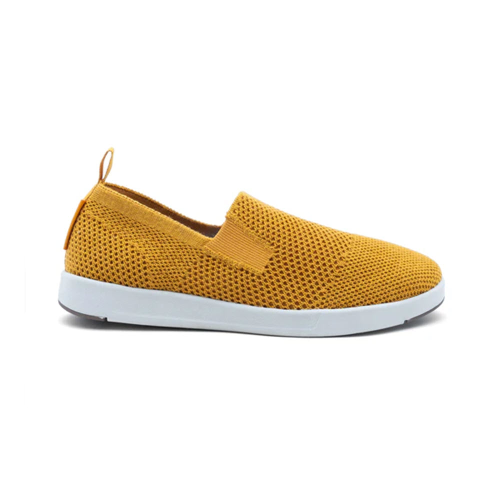 A Woolloomooloo WOOLLOOMOOLOO SUFFOLK MUSTARD - WOMENS, a yellow slip-on everyday shoe with a white rubber sole, featuring a breathable mesh upper, comfort outsole, and a pull tab at the heel.