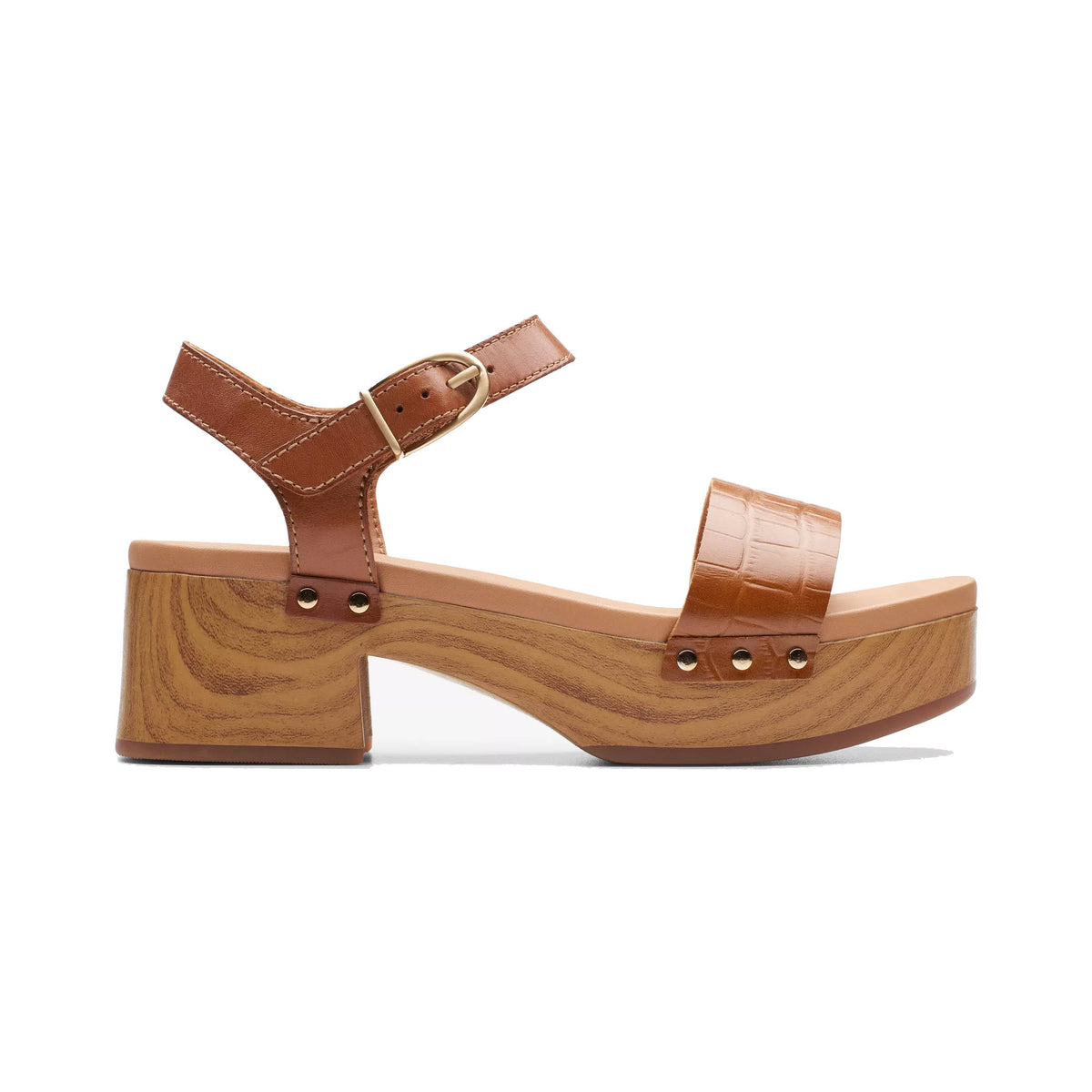 Side view of a single CLARKS SIVANNE WALK TAN - WOMENS brown platform clog featuring a wooden block heel and an ankle strap with buckle closure, offering summer comfort.