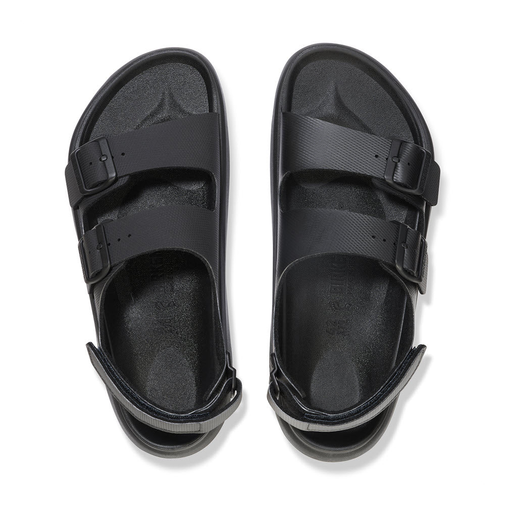 A pair of black two-strap Birkenstock BIRKENSTOCK MOGAMI TERRA OASIS BLACK - WOMENS sandals with a durable sandal design and a waterproof footbed.