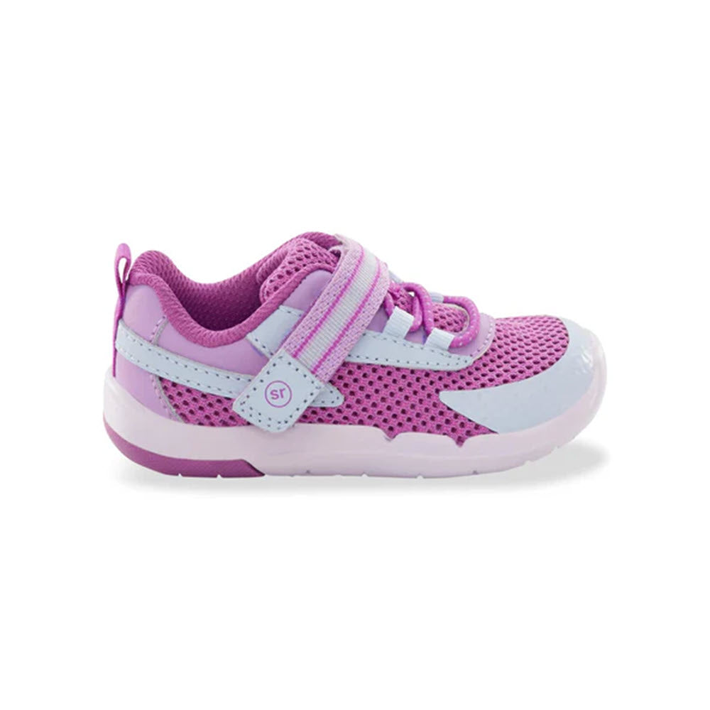 The Stride Rite SRT Ian Purple - Kids athletic shoe showcases a pink and purple color scheme with Velcro straps, white accents, and a memory foam footbed for enhanced comfort.