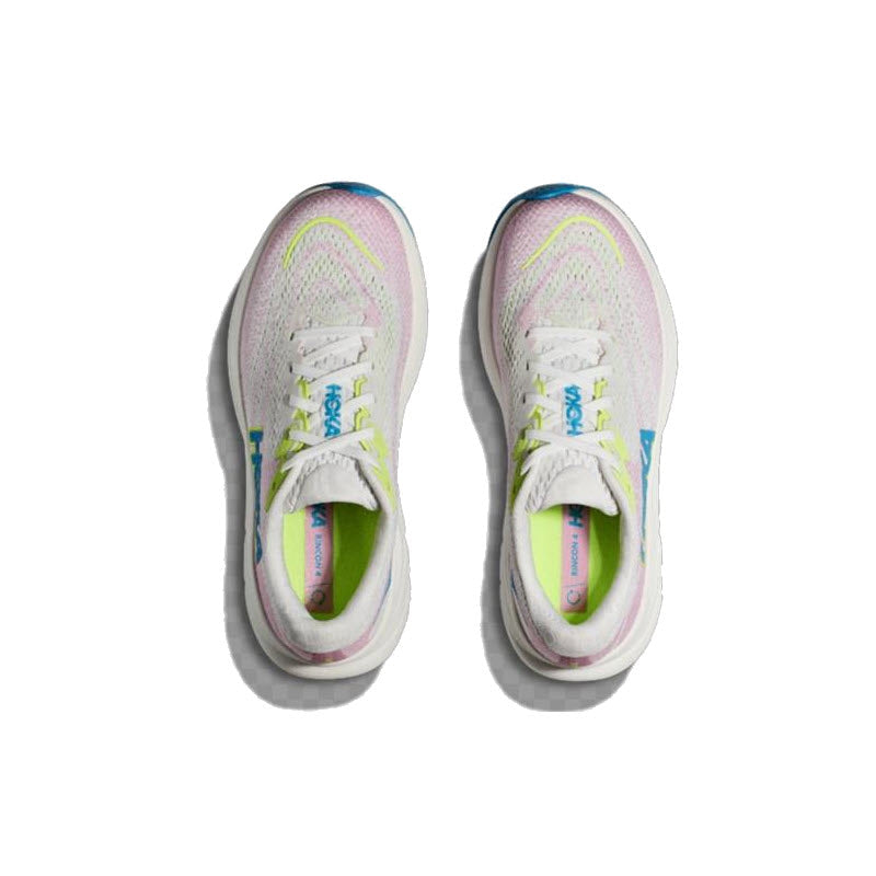 A pair of HOKA RINCON 4 FROST/PINK TWILIGHT women&#39;s athletic shoes by Hoka, featuring white with light pink, yellow, and blue accents, viewed from above. Enjoy uber-light softness and an exceptional cushion-to-weight ratio with every step.