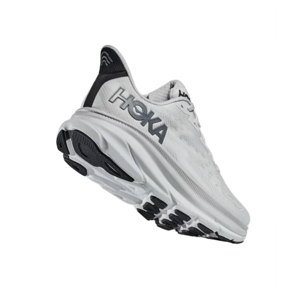 A single HOKA Clifton 9 Nimbus Cloud/Steel Wool men&#39;s athletic shoe by Hoka is shown against a plain white background, emphasizing its responsive foam cushioning and structure.