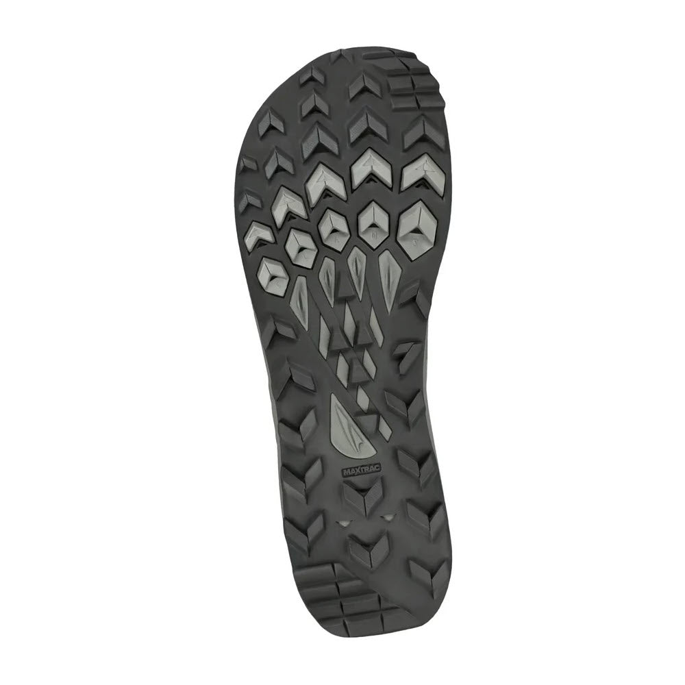 Close-up view of the ALTRA LONE PEAK 8 TAUPE - MENS shoe sole featuring a pattern of variously shaped treads, expertly crafted with Altra&#39;s MaxTrac™ outsole for superior traction on trail adventures.