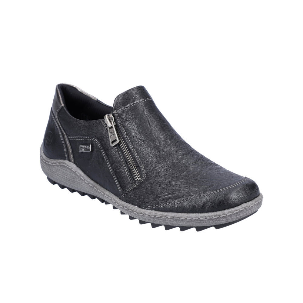 The REMONTE EURO CITY SLIP ON BLACK - WOMENS by Remonte is a black leather slip-on sneaker featuring a side zipper, textured sole, and detailed stitching around the upper and lower edges—perfect for a business casual look.