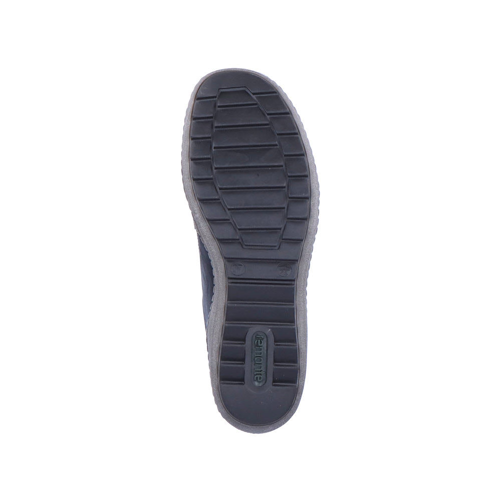 Sole of a Remonte Euro City Slip-On Black sneaker with a dark rubber tread, featuring the brand name &quot;Remonte&quot; embossed near the heel area.