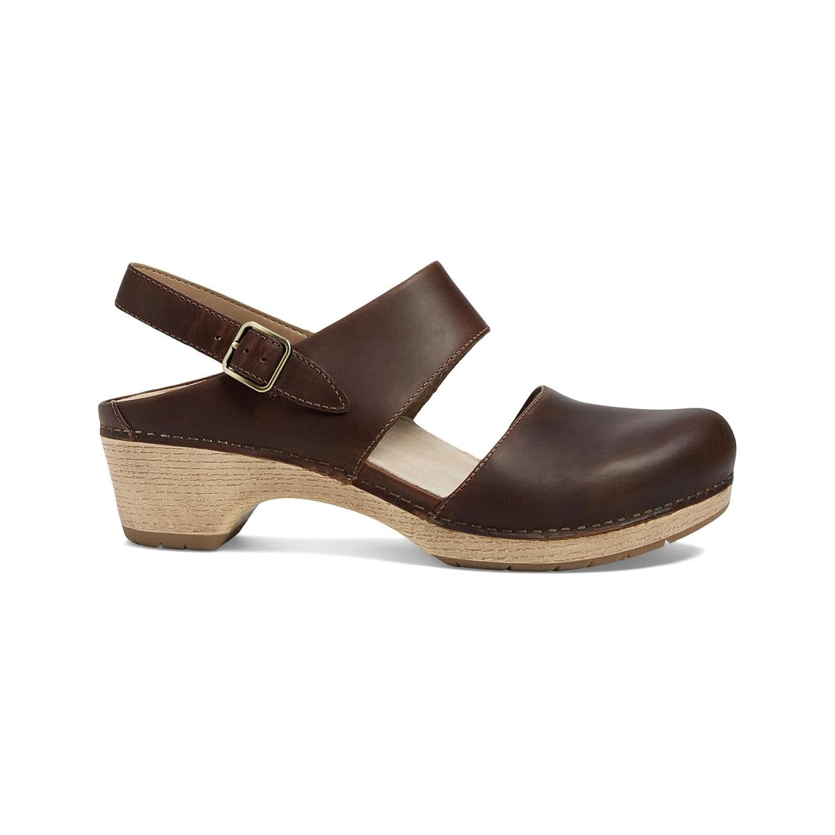 The Dansko Lucia Tan - Women&#39;s clog, made from brown leather, features an adjustable buckle strap and a low wooden heel. It includes a cushioned EVA insole for added comfort and is viewed from the side.