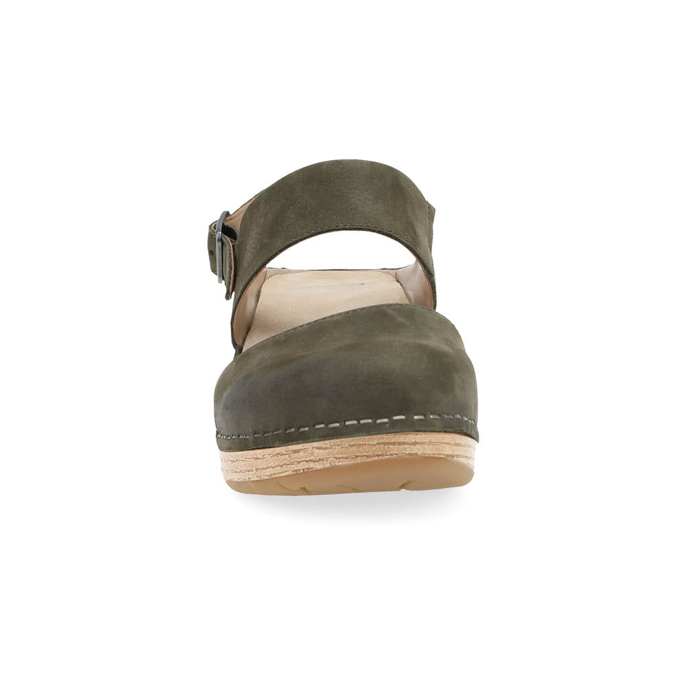 Dansko DANSKO LUCIA IVY - WOMENS olive green women’s heeled clog featuring a front strap with buckle, white stitching, and a light wooden sole. Perfect for fall footwear.