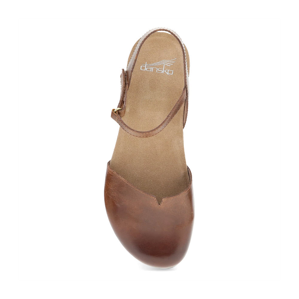 Top view of a brown Dansko Rowan Tan Leather - Womens with a closed toe, ankle strap, and a cushy memory foam footbed by Dansko.