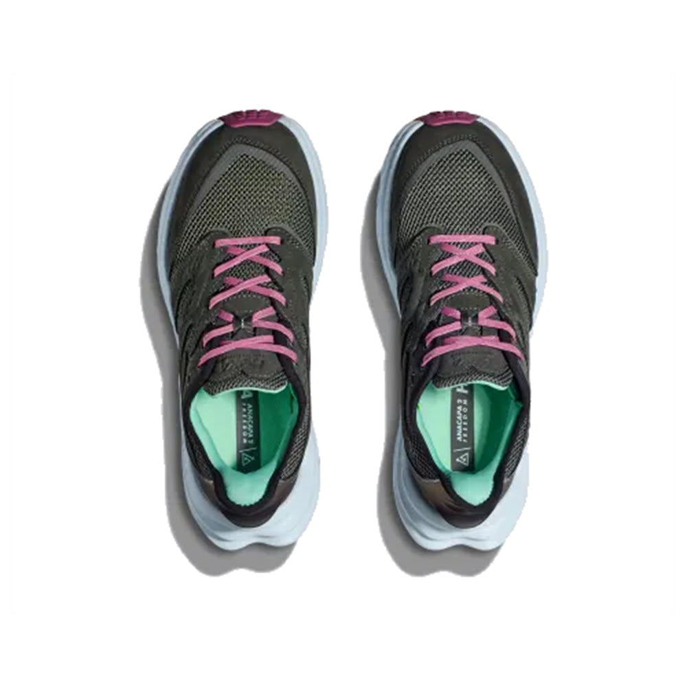 Top view of the HOKA Anacapa 2 in the Freedom Outer Orbit/Overcast colorway, featuring green athletic shoes with pink laces, an ultra-ventilated upper, green inner lining, and white soles on a white background.