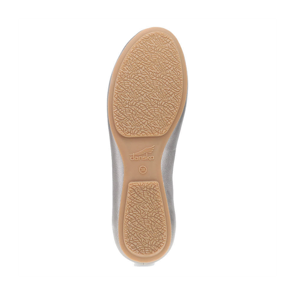 Bottom view of a Dansko shoe showing the textured rubber sole with the Dansko logo and size 39 marked in the center, highlighting chic comfort similar to Dansko&#39;s DANSKO MOLLIE PEWTER - WOMENS collection.