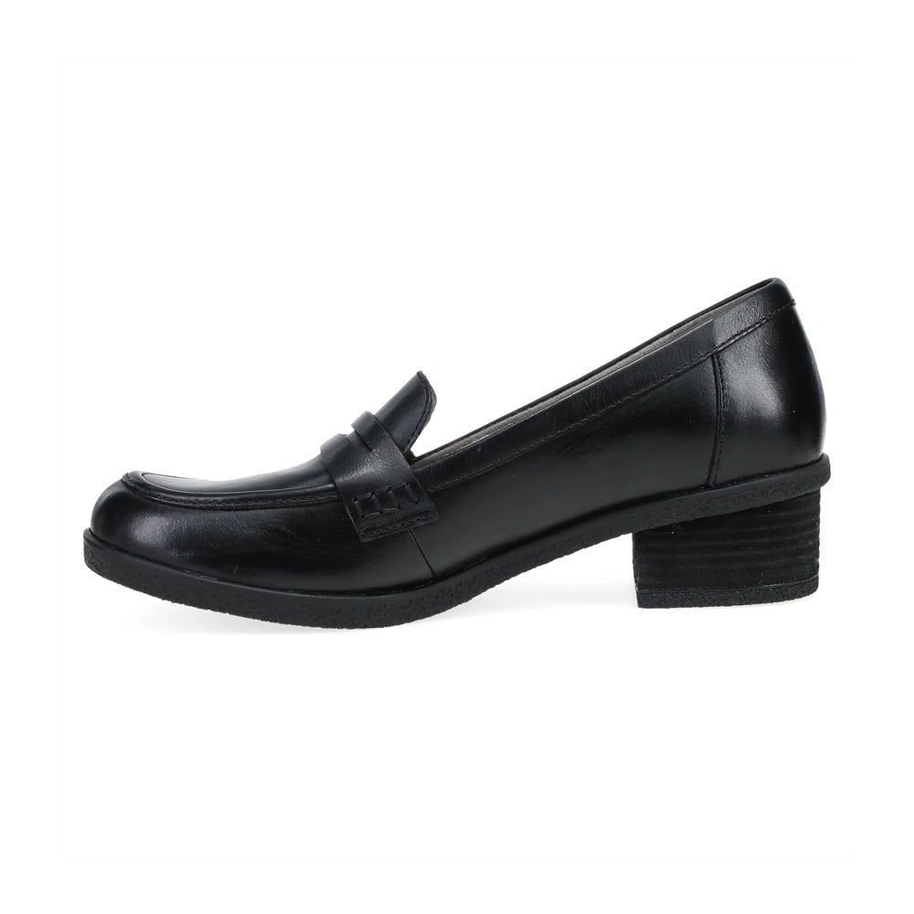 A Dansko Danica Black women&#39;s chunky loafer with a subtle heel, viewed from the side against a white background.