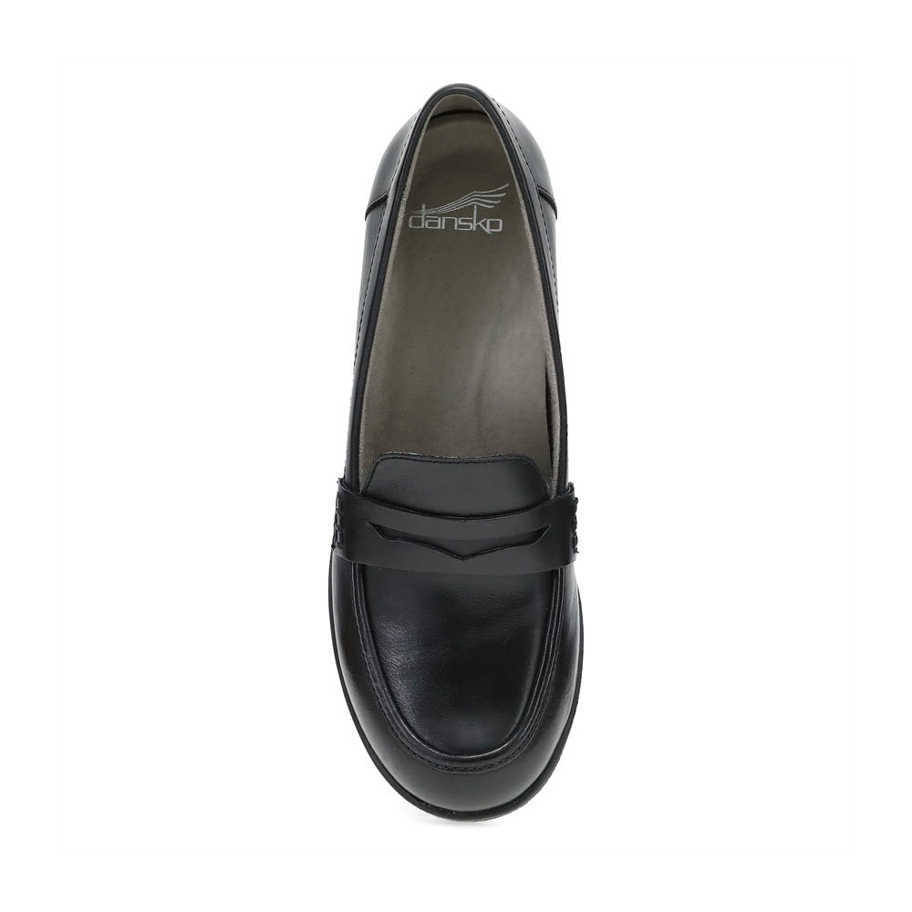 Top view of the Dansko Danica Black women&#39;s loafer, featuring a subtle heel and minimalist design.