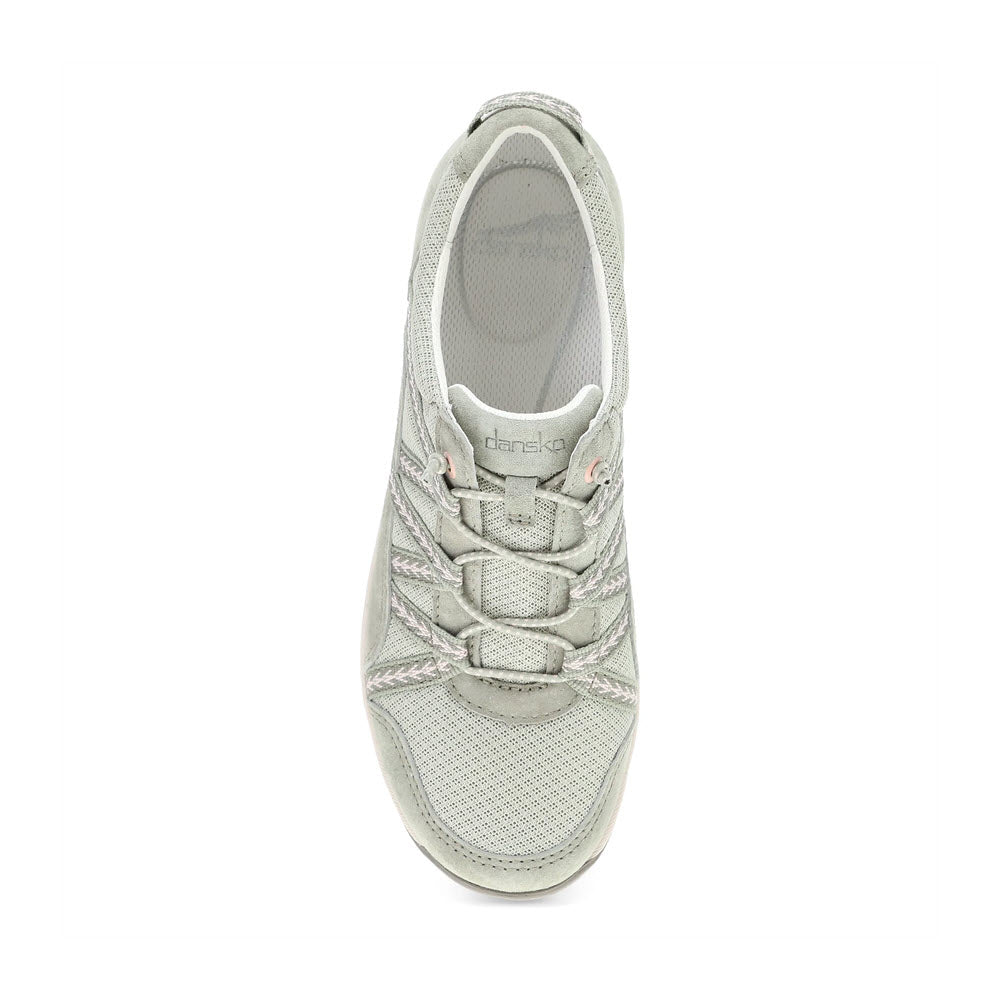 Top view of a light grey DANSKO HARLYN SAGE - WOMENS with a knitted mesh design, lace-up closure, and visible Dansko logo on the tongue, offering lightweight performance and premium support.