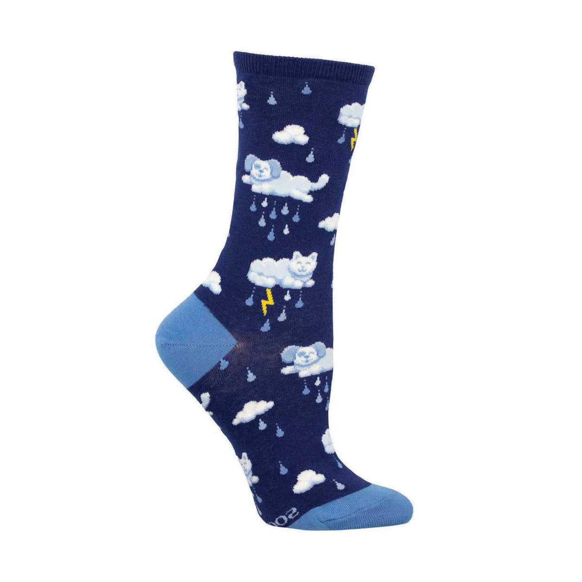 The SOCKSMITH RAINING CATS &amp; DOGS CREW SOCKS NAVY for women by Socksmith feature a vibrant navy blue background adorned with patterns of clouds, raindrops, lightning, and white cat faces. The toe, heel, and cuff are a lighter shade of blue, adding a playful touch to the design.