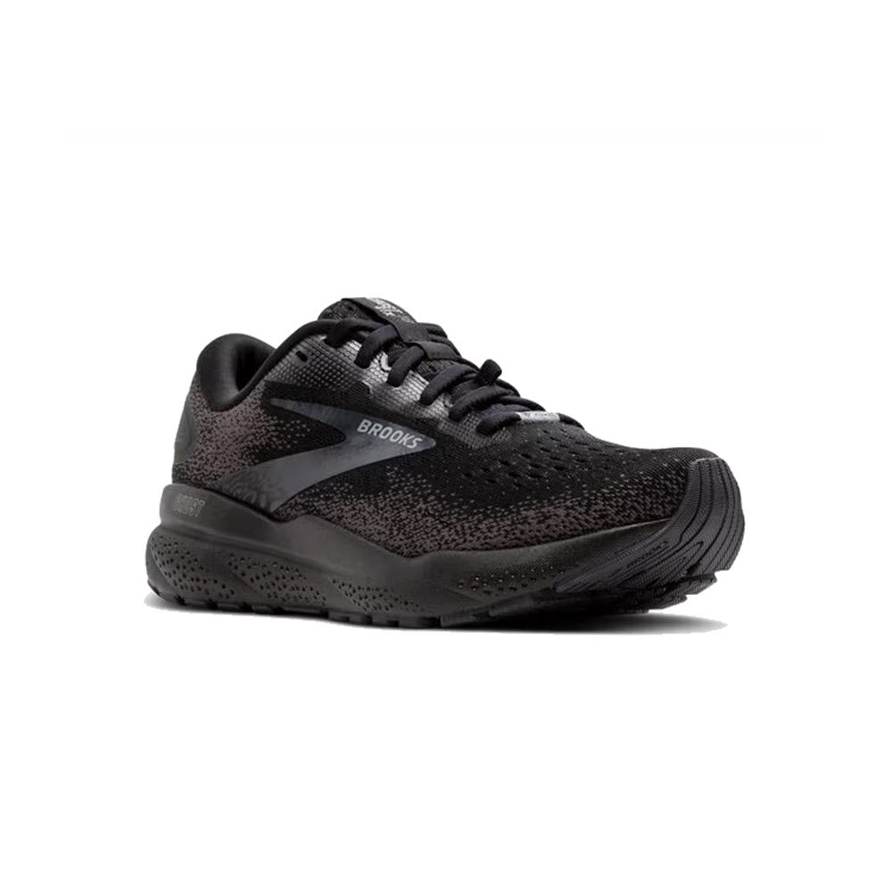 The BROOKS GHOST 16 GTX BLACK/BLACK/EBONY, a black women&#39;s running shoe by Brooks, features a textured sole and a breathable GORE-TEX mesh upper design with a branded logo on the side. The sneaker is positioned at a slight angle, revealing the outer side and toe.