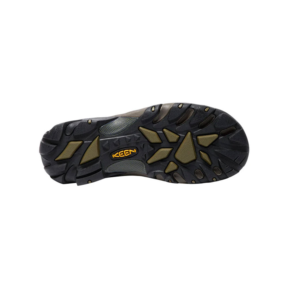 The image shows the sole of a KEEN TARGHEE II CANTEEN/DARK OLIVE - MENS shoe, featuring a black and grey tread pattern with tan accents and a yellow Keen logo near the center. The design ensures excellent traction on various surfaces.