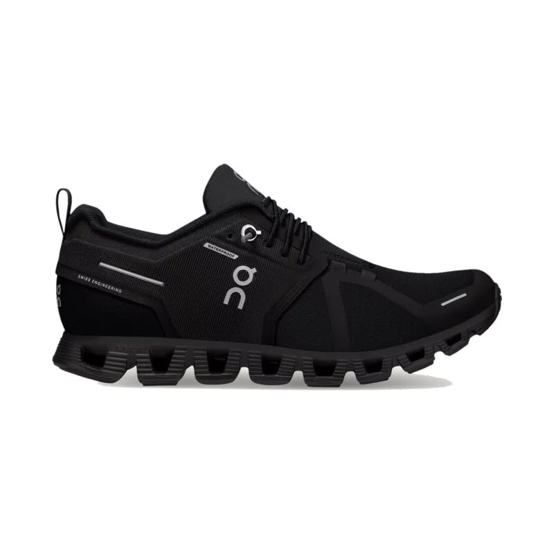 ON CLOUD 5 WATERPROOF ALL BLACK - WOMENS by On Running: a black athletic shoe with a sleek design, featuring a white logo, CloudTec cushioning, and a unique cloud-like sole.