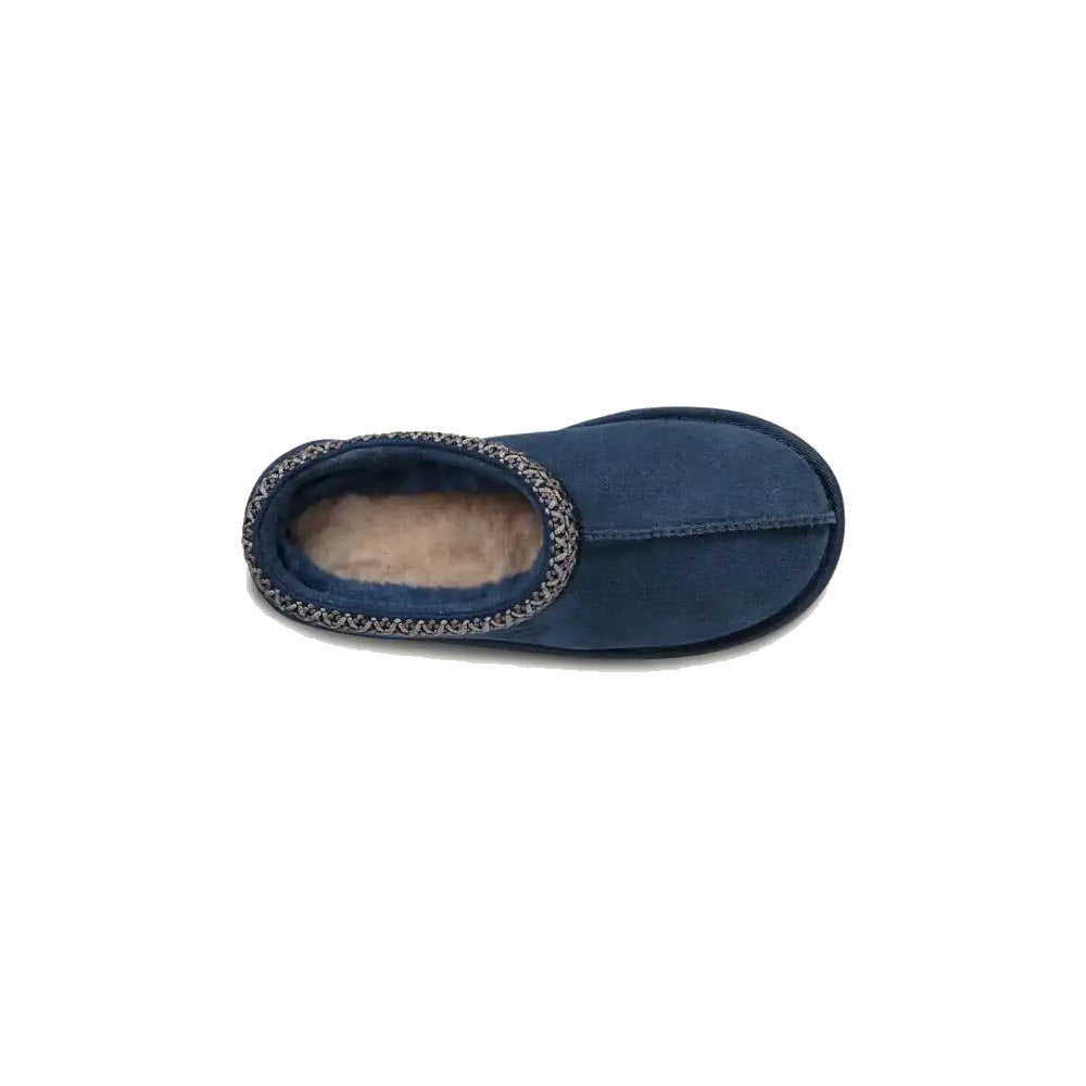 Top view of a single UGG Tasman II New Navy slipper, featuring a soft lining and decorative trim, perfect for indoor lounging.