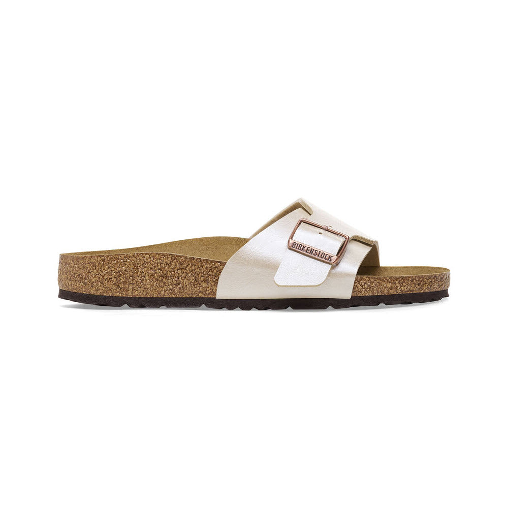 Side view of a single white Birkenstock Catalina Graceful Pearl White - Womens sandal with a thick strap featuring a copper buckle and a cork footbed, crafted from shimmery Birko-Flor.