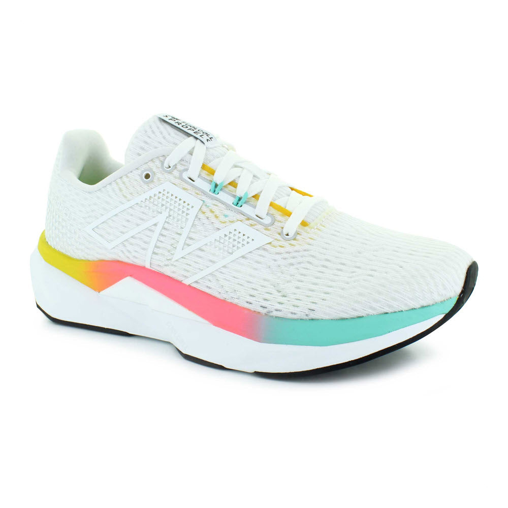 The New Balance Propel V5 women&#39;s shoe in White/Cyber Jade/Ginger Lemon features a stylish design with yellow, pink, and blue accents, a black sole, and a FuelCell midsole made from bio-based content.