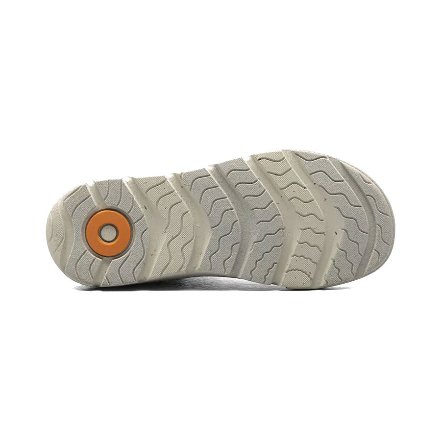 A perfect fit for BOGS SKYLINE HIGH TOP BLACK - KIDS, this shoe sole features water resistance, a wavy tread pattern, and an orange circular insert near the heel area.