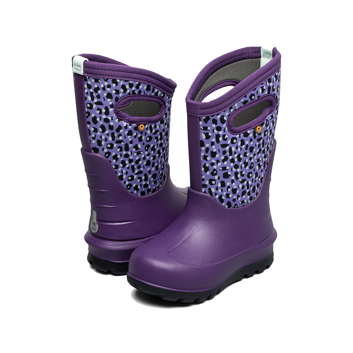 The BOGS NEO-CLASSIC JOYFUL JUNGLE - KIDS by Bogs are a pair of purple children&#39;s rain boots featuring black and white leopard print patterns, built-in handles for easy wear, and rebound cushioning. These 100% waterproof boots are comfort rated to -35°F/-37°C.