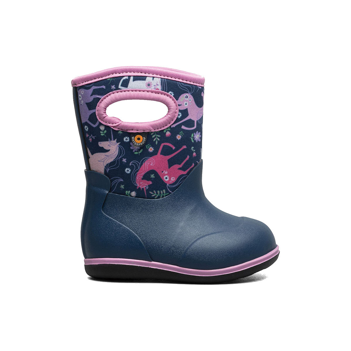 The Bogs Baby Classic Unicorn Meadow - Kids rubber boot, from the renowned brand Bogs, features a navy blue base with a delightful pink trim and a vibrant unicorn pattern on the upper section. This ultra-lightweight, waterproof design is perfect for keeping little feet dry and ready for any toddler adventure.