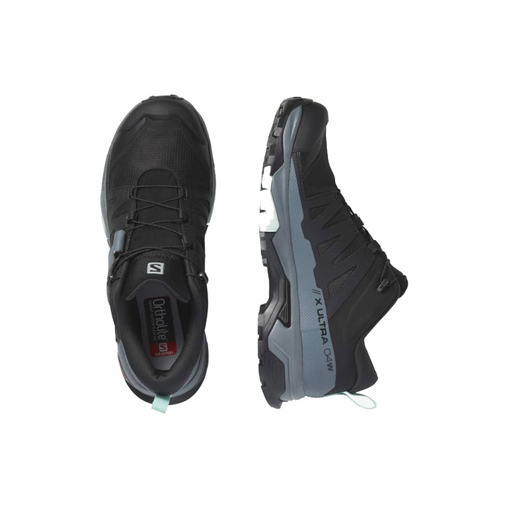 Top and side view of a pair of SALOMON X ULTRA 4 hiking shoes in Black/Stormy Weather/Opal Blue, with &quot;X Ultra 4 W&quot; and &quot;Salomon&quot; branding, featuring rugged Contragrip MA soles and lace-up closures.