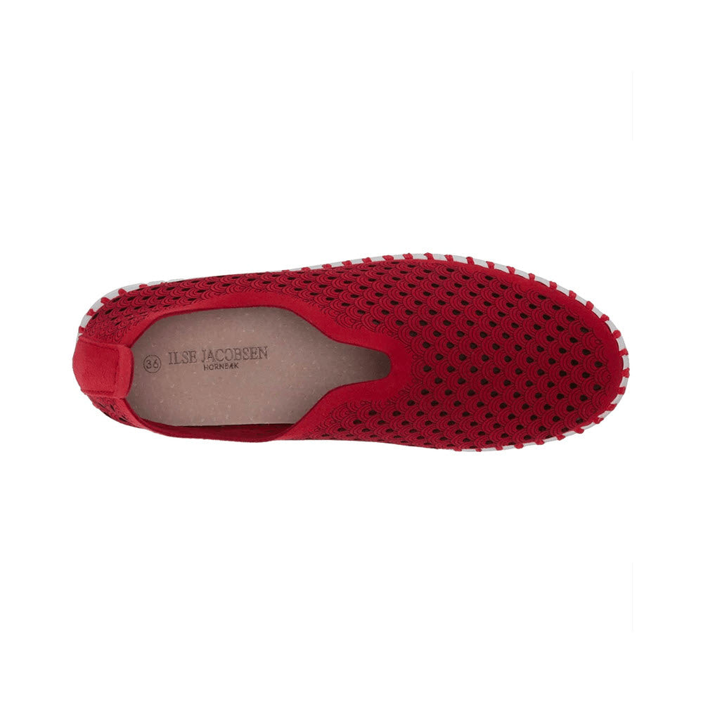 Top view of a single ILSE JACOBSEN TULIP 139 BRICK RED slip-on shoe, showcasing its lightweight design with a perforated pattern and the insole imprinted with the brand name &quot;Ilse Jacobsen.&quot; This stylish women&#39;s shoe features recycled microfiber uppers and includes a removable insole for added convenience.