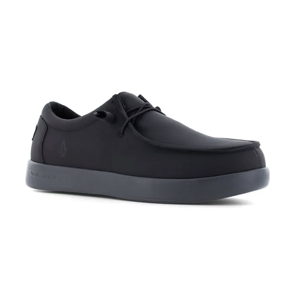 The Volcom Composite Toe Chill Slip On ESD Work Shoe in black for women boasts a minimalist design with a low-top silhouette and a gray sole. This water-resistant masterpiece ensures durability and style in any condition.