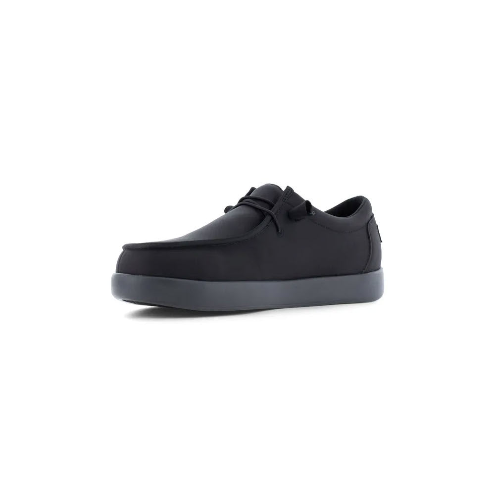 A black, low-top VOLCOM COMPOSITE TOE CHILL SLIP ON ESD WORK SHOE for women by Volcom, featuring a lace-up design and a gray sole, displayed on a white background.