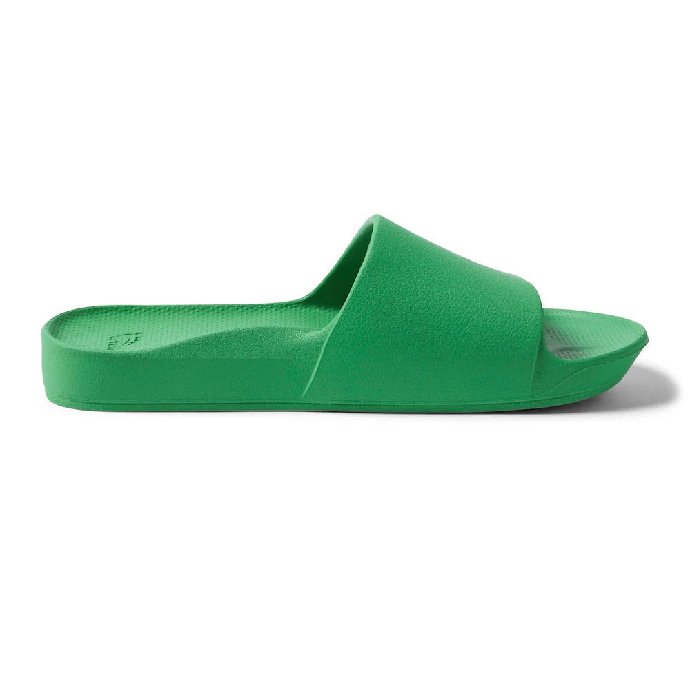 A single green Archies ARCHIES SLIDES with an open-toe design and a flat sole, offering excellent orthotic support to help alleviate plantar fasciitis discomfort.