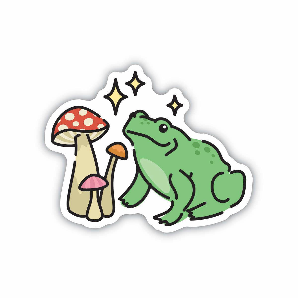 Illustration of a green frog sitting beside three mushrooms, one of which is red and white, with sparkles in the background. Perfect as a vibrant laptop sticker to add some whimsy to your tech gear, STICKERS NORTHWEST FROG & MUSHROOMS by Stickers Northwest.