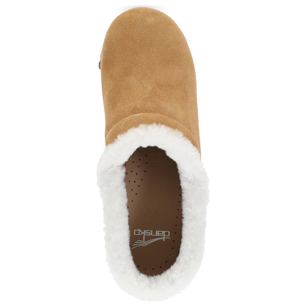 Top view of the Dansko Professional Cozy Suede for women, a clog-style slipper in brown suede, featuring a reinforced toe box, white fur lining, and a dotted insole.