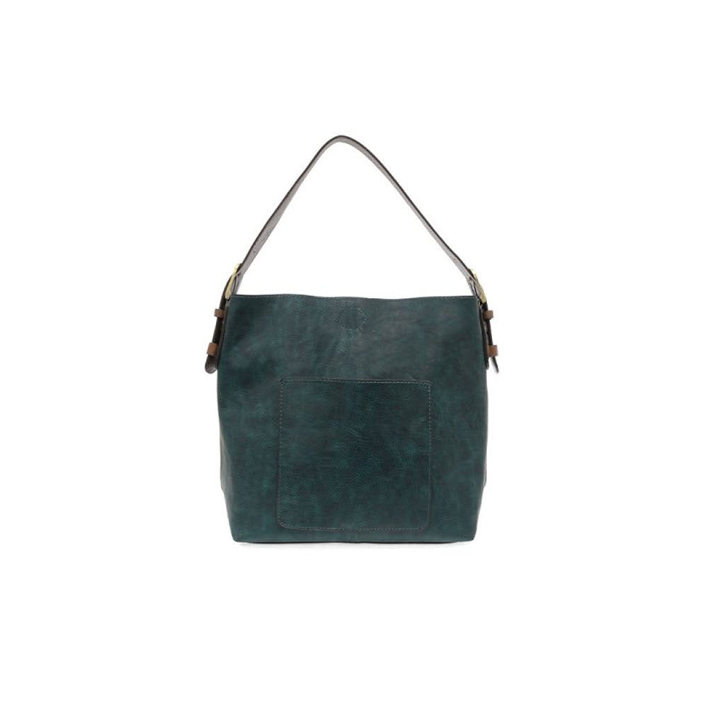 Remarkably versatile, the JOY SUSAN HOBO BAG VIVID TEAL by Joy Susan is a vivid teal vegan leather handbag featuring a large front pocket and a single shoulder strap, perfect for those who appreciate the classic hobo design in a spacious bag.