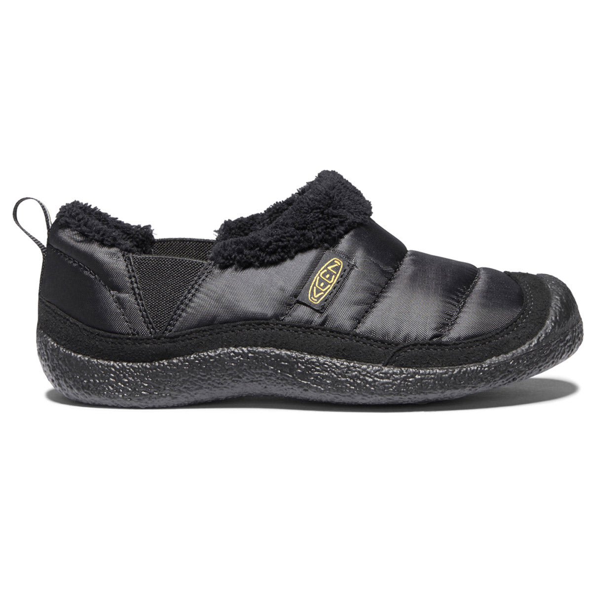A single Keen Howser II Youth Black slip-on shoe with a fleece lining and rubber sole.